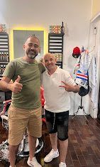 Hassan with a happy client